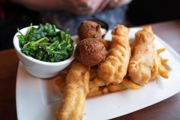 Fish -n- chips with sauteed spinach and hush puppies