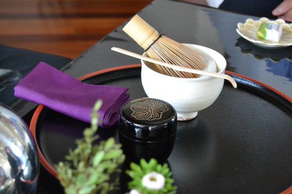 Close up of Japanese tea ceremony utensils and matcha