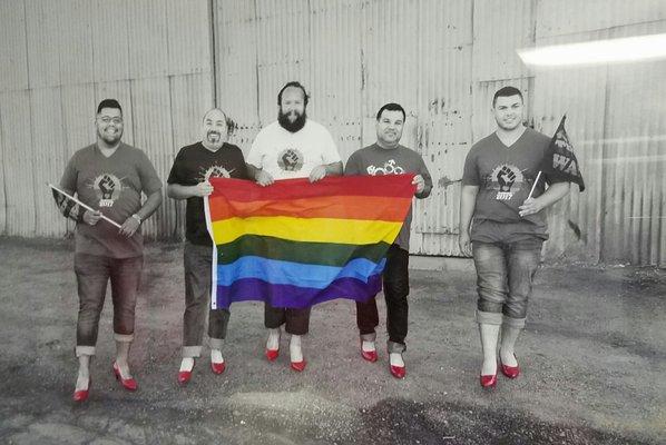 Showing off their pride and red heels!