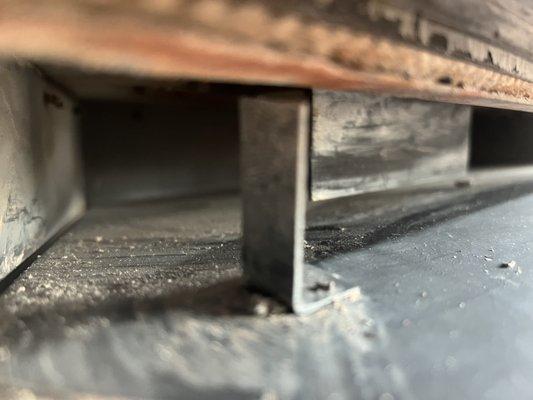 Abundant dust visible from the front of the fireplace