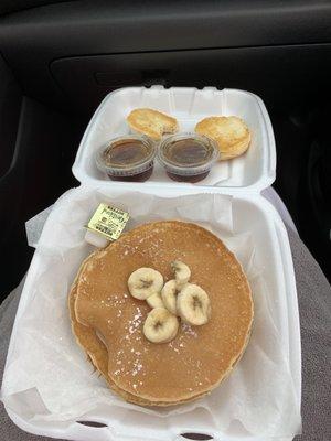 Banana pancakes, biscuits, and syrup