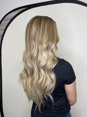 Woman's full highlight, mixed with teased balayage and baby lights