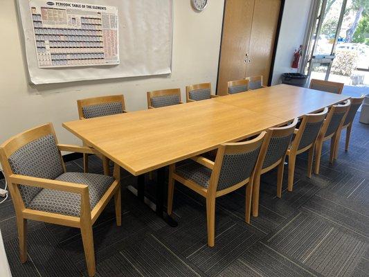 Refinished table top, chairs and reupholstered in 100% polyester for Pomona college in Claremont Ca