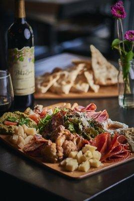 The perfect Bistroboard with double charcuterie & cheeses,  crispy brussels, jalapeño hummus, grilled artichokes and so much more!