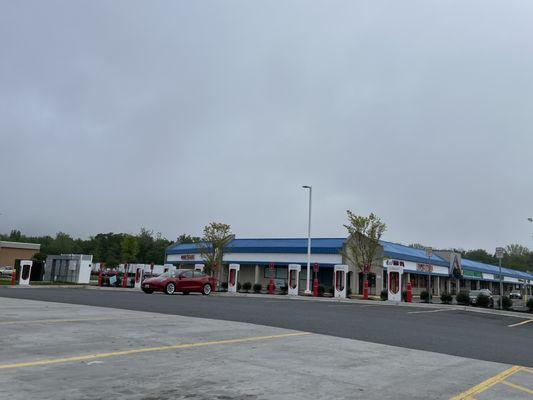 Tesla superchargers in the Wawa parking lot.