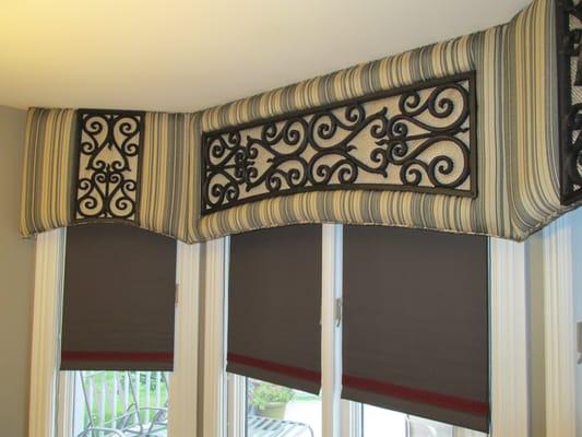 Bay window cornices with inset tableaux.