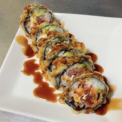 Las Vegas roll
 Inside: four kinds of fish, crab, avocado, cream cheese 
 Outside: (deep fried) eel sauce