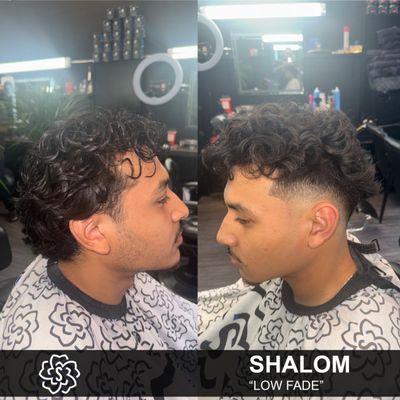 Shalom executed a sleek low fade for a sharp and polished finish!