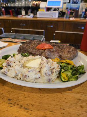 16 Oz sirloin steak with garlic mash and seasoned veggies! Yum!