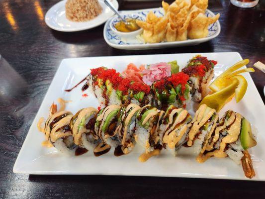 Crab Rangoon, caterpillar roll, and dragon roll.