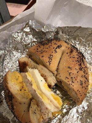 Egg and sausage on a toasted Poppyseed bagel.