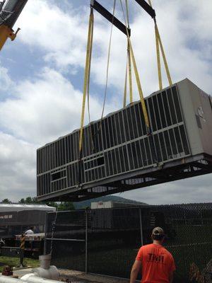 Installing a new energy efficient chiller for a school.