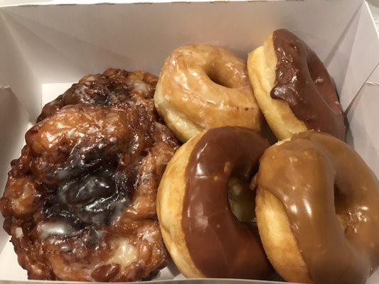 Apple fritters, chocolate glazed, maple glazed, and a cronut!