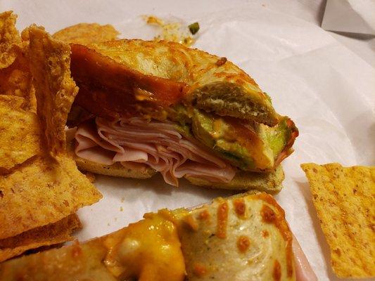 Turkey bacon and avocado on a cheddar bagel.