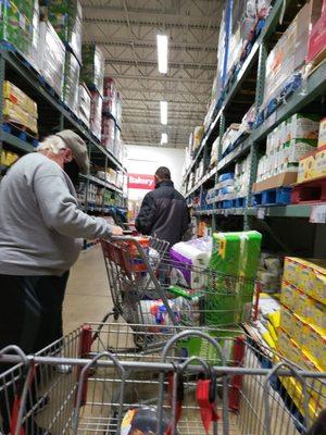 The line that runs the length of the store and wraps around the last aisle