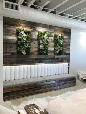 Reclaimed wood banquette and wall.