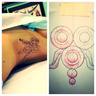 left side was the sketch AJ sent me. then the picture is the outline on my body (clearly, not the tattoo)