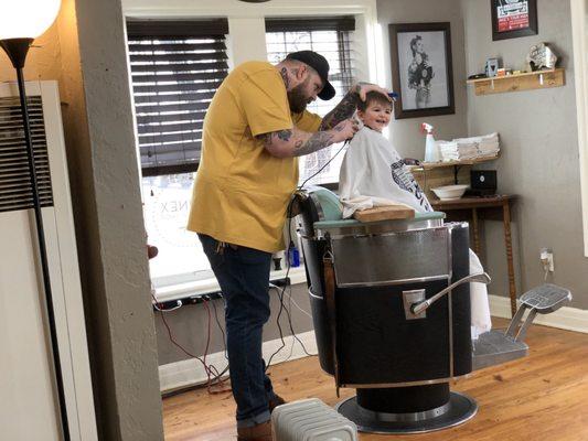 Gatlin getting hair cut by Jake the Barber!