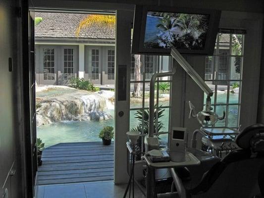 Our treatment rooms overlook a beautiful pond with waterfalls.