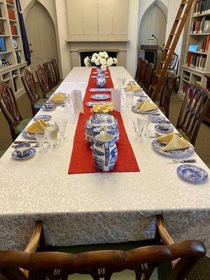 Authentically set table including period flatware.