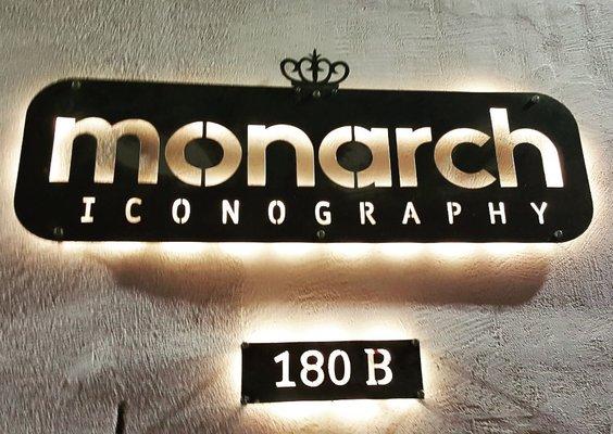 The sign above the front door of Monarch Iconography Studio.