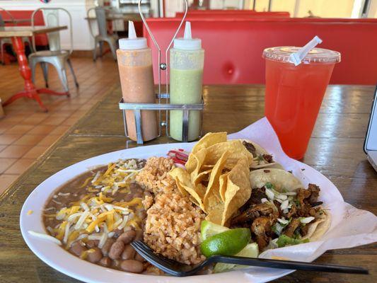 3 delicious tacos with beans and rice