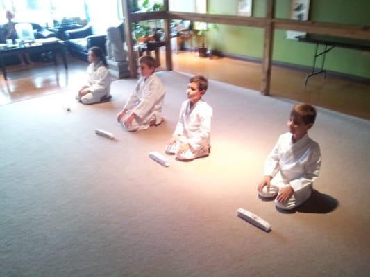 Children's partner class during meditation.