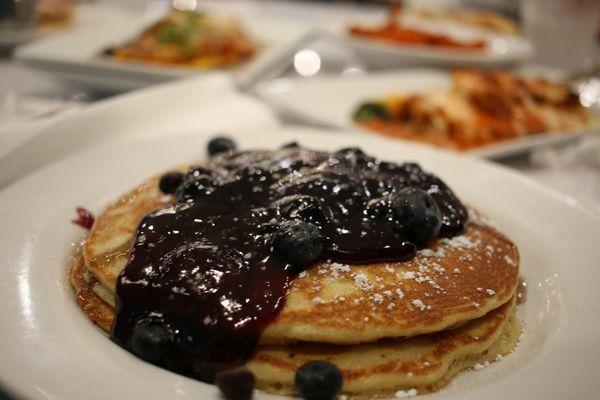 Lemon Ricotta Pancakes Our lightest stak, with creamy Ricotta cheese, infused with juice and zest of fresh lemons, blueberry syrup