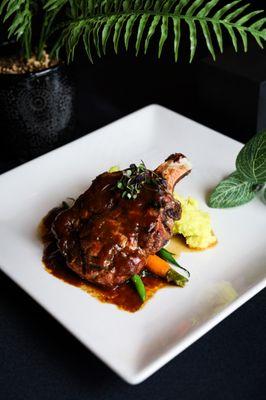 Roasted Pork Chop - with creamy demi-glacé, loaded mashed potatoes and seasonal vegetables