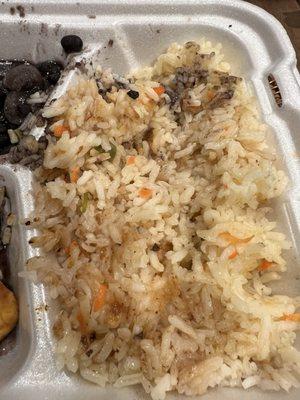 Looked like vegetable fried rice from a Chinese restaurant. Was really moist and greasy as well. Horrible even w the beans.