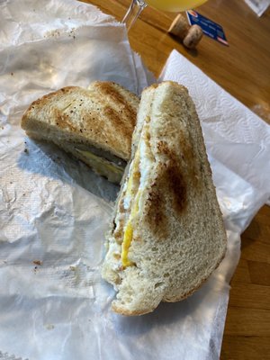 Sausage egg and cheese on sourdough bread