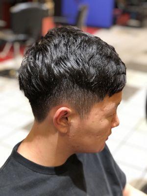 Fade with some texture up top.  Done By Quoc (Q)