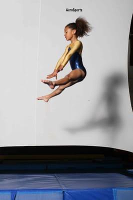 AcroSports Youth Gymnast on the trampoline.