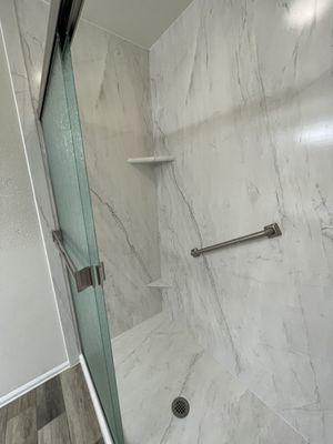 Shower with single panels all the way to the ceiling!