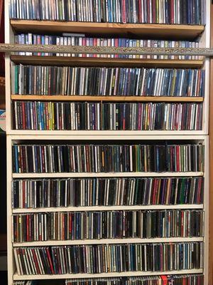 One of our CD racks and cheaper than a jukebox play!