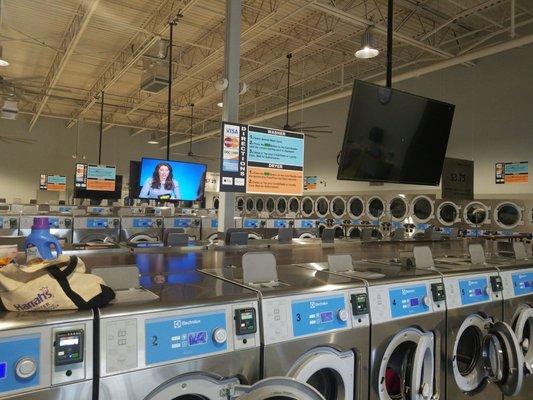 It's easily 75 washers in here! And 60 dryers