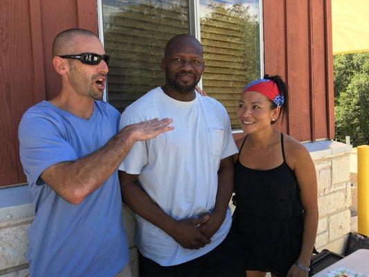 Master Chris regales dojang co-owner/wife Ms. Tieu & friend/teacher Master Malick Coulibaly dit Fall of Harlem TaeKwonDo (new dojang opens)