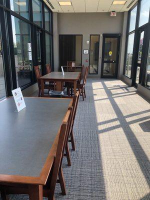 A hallway to the other smaller courtyard