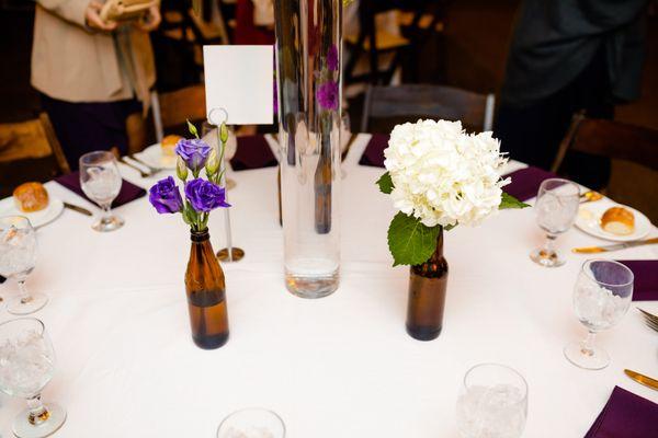 We had an unexpected last minute venue change and Stephanie incorporated beer bottles to bring elements from our original venue plans.