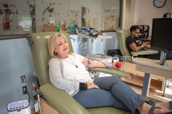 Donor giving blood.