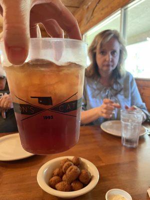 Souvenir cup, hush puppies, mom