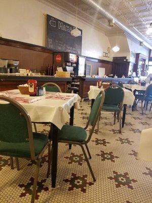 A portion of the dining area and counter.