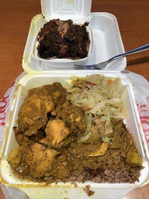 Large Curry Chicken w/rice & peas and cabbage... (up top) mini Jerk Chicken on white rice