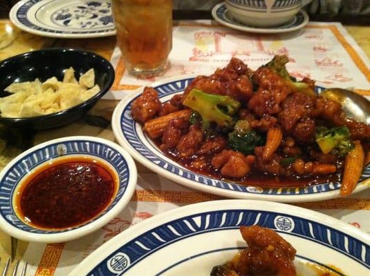 Chicken with spicy orange sauce & a side bowl of their hot sauce. Bring on the sweats !!