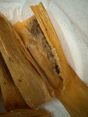 Dry messy wrapped pork tamales