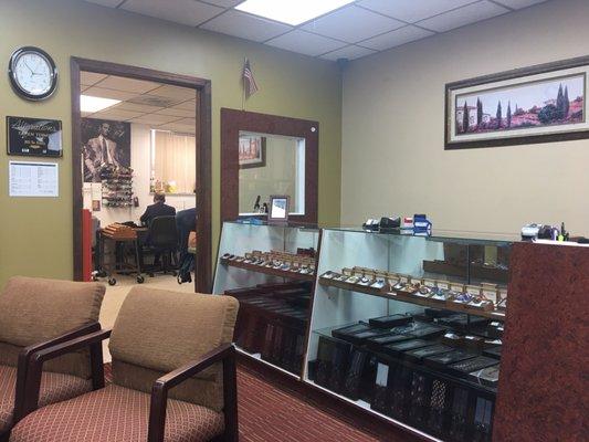 Front desk looking into their tailoring area.