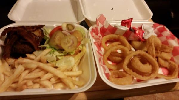 Bout to tear up this Hawaiian burger and onion rings. Whatever is left gets eaten for breakfast and lunch.