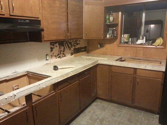 Busby home kitchen tiling in progress.