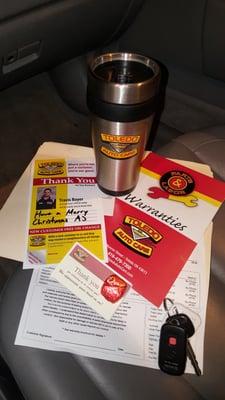 I got my thank you travel mug, chocolate and card, mirror tag, warranty card - 3 yrs/36,000 miles - and detailed receipt.