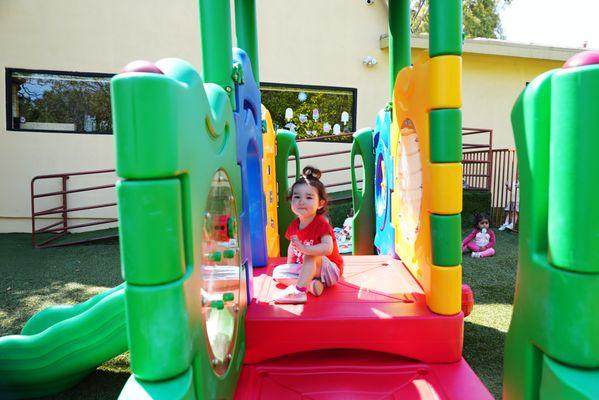 Toddler in our outdoor play area